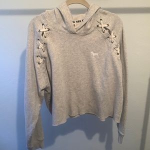 Cropped grey hoodie. With shoulder detail.